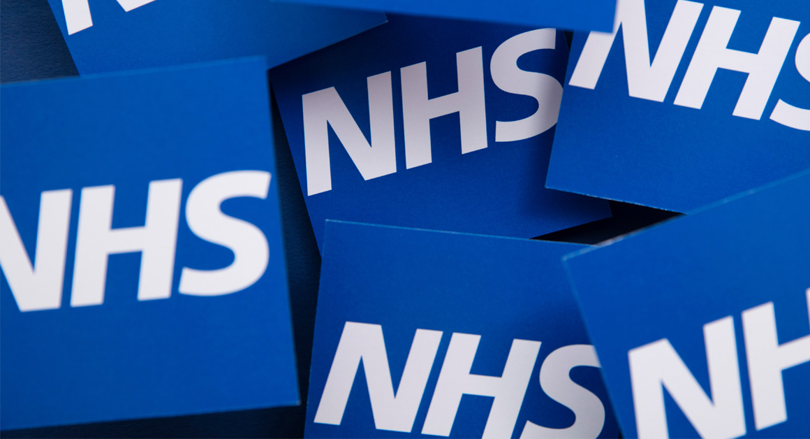 LONDON, UK - July 2021: NHS National health service logo on a blue background.