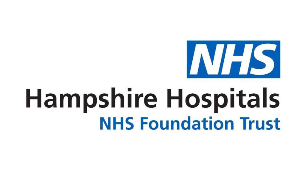 Logo for Hampshire Hospitals NHS Foundation Trust, featuring the NHS logo above the organisation’s name in black and blue text on a white background.