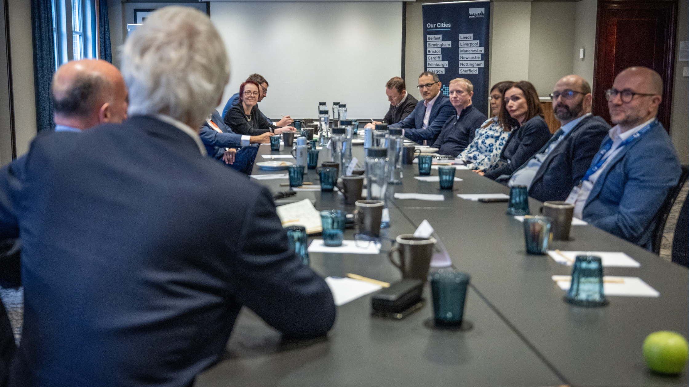 Leaders from Core Cities and combined authorities discuss fiscal devolution at a UKREiiF roundtable hosted by The MJ and IMPOWER.